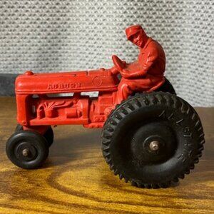 Vintage 1930's-1940's Red Solid Rubber Tractor by Auburn. Made in the USA
